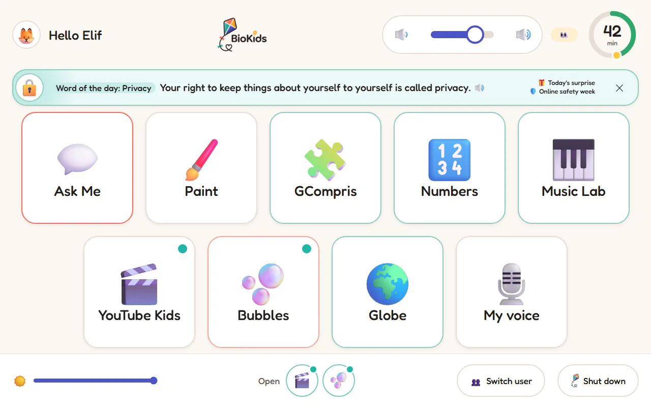 The child's launcher: big tiles such as Ask Me, Paint, GCompris, Numbers and Music Lab; volume and time left at the top, brightness and open apps at the bottom.