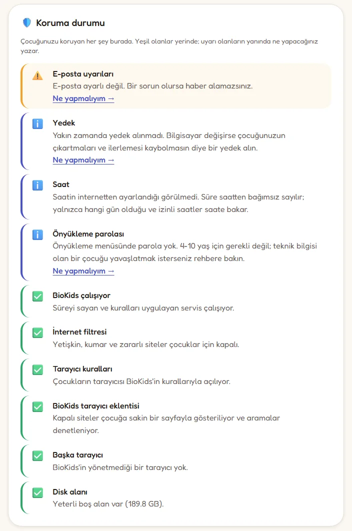 Koruma durumu listesi: e-posta uyarıları için bir uyarı, yedek, saat ve önyükleme parolası için bilgi notları, diğerleri yeşil.